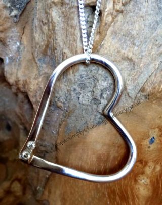silver heart with cubic zirconia